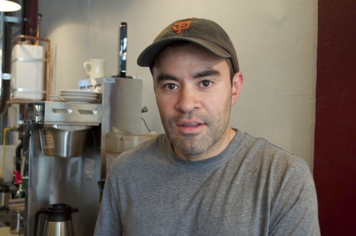Carlos Salmeron is one of the first cafe owners in Seattle with family heritage in a coffee sourcing country and coffee farming. (Photo by Janelle Retka)