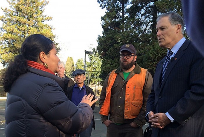 Paulina Lopez shows Gov. Inslee the South Park community center basketball courts, where tens of thousands of trucks drive by. (Photo via Gov. Jay Inslee's Flickr)