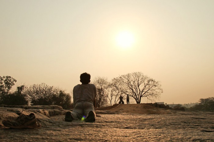 Hey, where's his lululemons? An Indian man practices yoga at dawn near Bangalore (Photo by Vinoth Chandar)