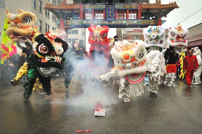 Lion dancers help celebrate Chinese Lunar New Year in Seattle’s International District in 2011. (Photo by Joe Mabel)
