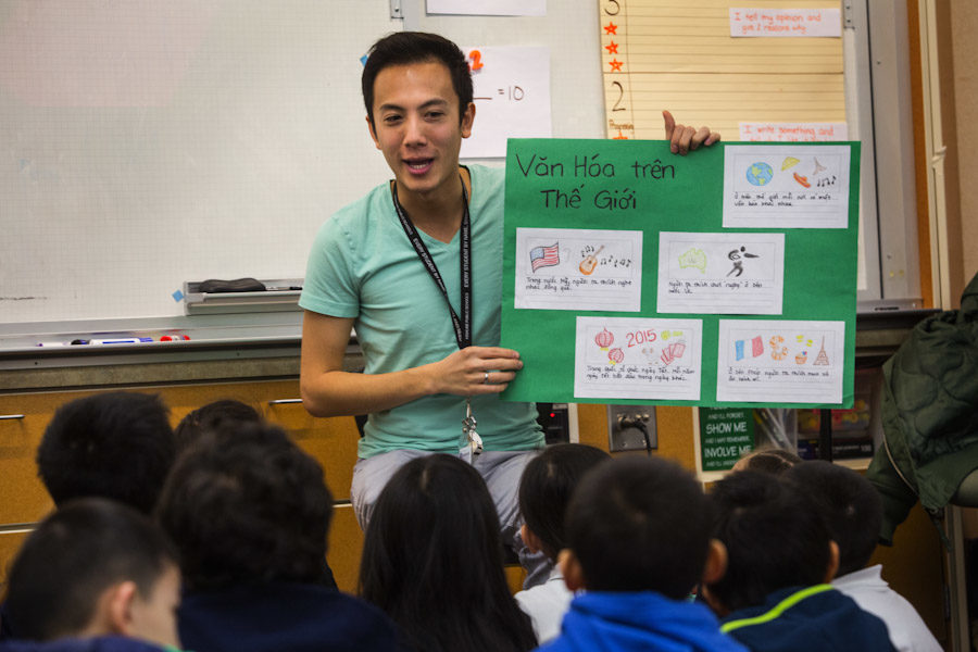 Tu Thanh Dinh, a first grade teacher at White Center Heights Elementary in Burien, leads a lesson to his first grade students in their Vietnamese immersion language class. (Photo by Ellen Banner / The Seattle Times)