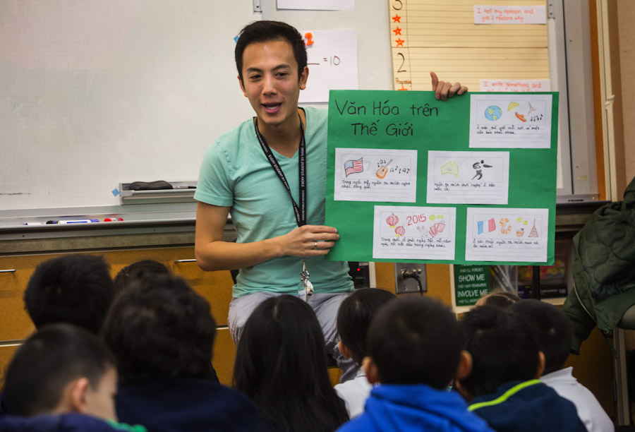 Tu Thanh Dinh, a first grade teacher at White Center Heights Elementary in Burien, leads a lesson to his first grade students in their Vietnamese immersion language class. (Photo by Ellen Banner / The Seattle Times)