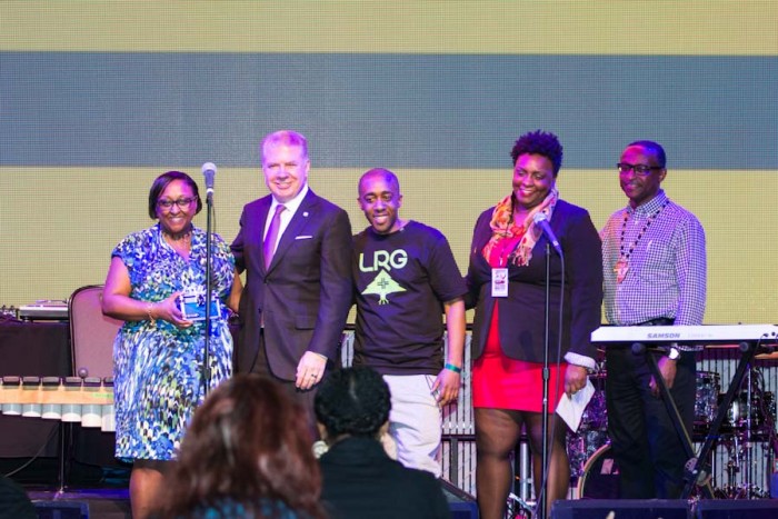 Draze, Mayor Ed Murray and others on stage for the creation of a time capsule honoring the Seattle hip hop scene. (Photo by Jama Abdirahman)