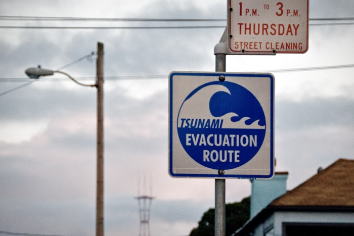 Tsunami hazard signs line the West Coast of the US. (Photo from Flickr by Daniel Hoherd)
