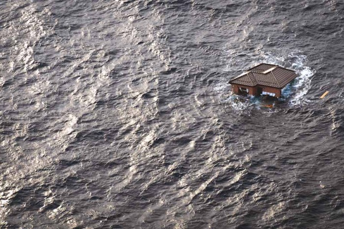 A house flooded by the 2011 Tōhoku earthquake and tsunami. (Photo from flickr by Douglas Sprott) 