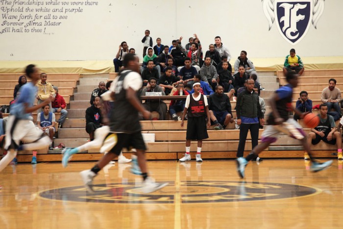 A game between Team Shafi and Team Al-Huda in the Companion Athletics basketball league at Foster High School in Tukwila last Sunday. The all East African basketball league started last year and now involves about 180 players. Players are required to keep their grades above a C average to participate. (Photo by Alex Stonehill)
