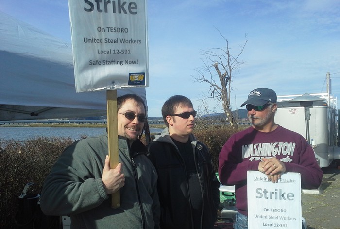 Striker Matt Moohart (far left) with Pierce Hoover (far right), who remember the seven friends they lost to the oil refinery explosion of 2010.