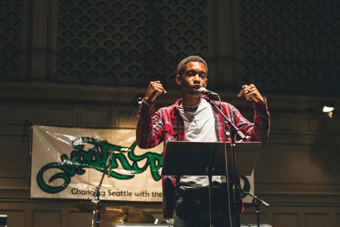 Darius Presley participates in the Youth Speaks Seattle Grand Slam Competition in April. (Photo by Travis Thompson.)