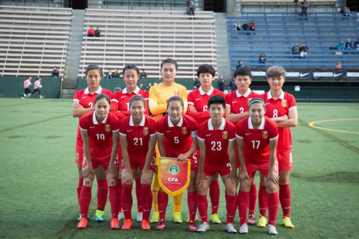 China's Women's National Soccer Team pose for a team shot right before their game against Seattle Reign FC on Friday night. In the front, from left to right: Ruyin Tan, Lisi Wang, Haiyan Wu, Guixin Ren, Yasha Gu. In the back, from left to right: Shanshan Liu, Rong Zhao, Fei Wang, Dongna Li, Shanshan Wang, Jun Ma. (Photo by Yiqin Weng)
