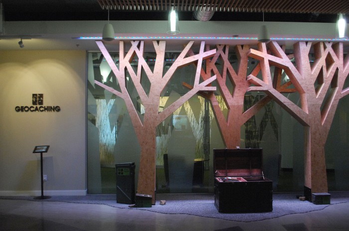 The foyer for Fremont-based Geocaching headquarters invites guests in to a simulated forest. (Photo by Joanna M. Kresge)