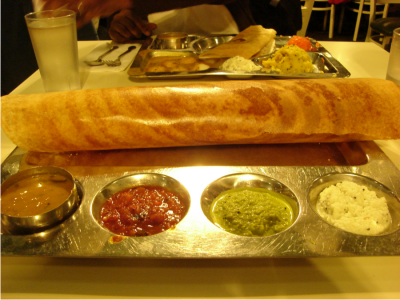 Photo of a dosa served with sambar and chutney.(photo by Mike Linksvayer via wikipedia.org)