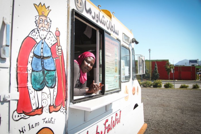 Omima Adam, 38, who came to Anchorage as a refugee from Sudan 5 years ago and now runs a food truck called "Sultan Shawarma" in Mountain View, hailed as the most diverse neighbhorhood in the U.S. according to data from the 2010 Census. (Photo by Alex Stonehill.)