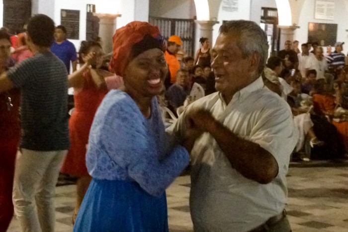Azeb is coerced onto the dance floor by a man named Victor at the Veracruz Zocalo. (Photo by Reagan Jackson)