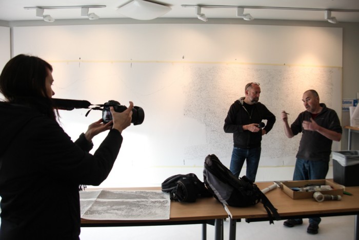 Cindy Apple films while Seattle filmmaker Dan Thornton talks with Scottish artist Keith Salmon, subject of the documentary Glen Rosa. (Courtesy photo)