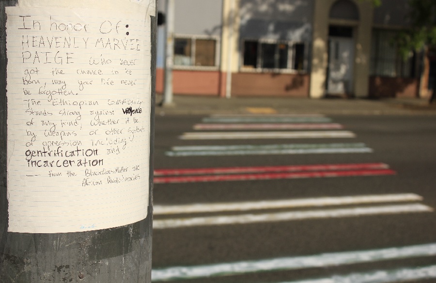 A note that accompanies the crosswalk paint job raises a series of somber concerns.(Photo by Goorish Wibneh) 