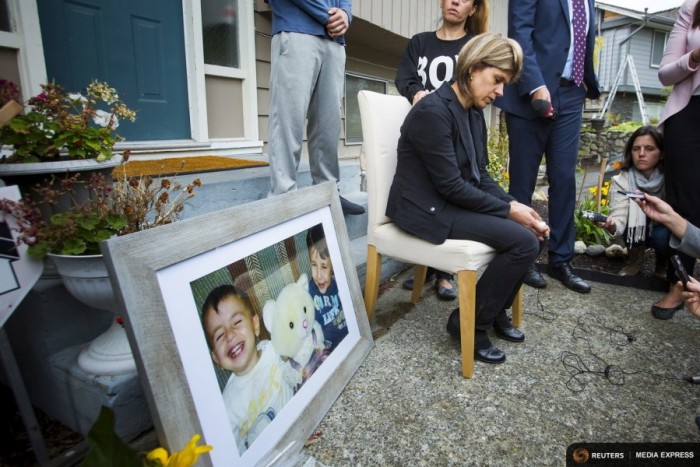 Tima Kurdi, sister of Syrian refugee Abdullah Kurdi whose sons Aylan and Galip and wife Rehan were among 12 people who drowned in Turkey trying to reach Greece, cries while speaking to the media outside her home in Coquitlam, British Columbia (Photo by Ben Nelms for Reuters.)