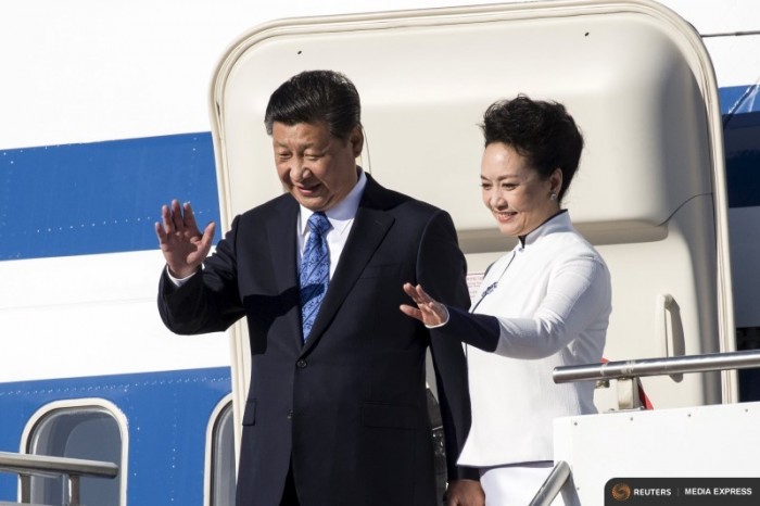 Chinese President Xi Jinping and First Lady Peng Liyuan arrive at Paine Field in Everett, Washington, September 22, 2015. (Photo by David Ryder for Reuters.)