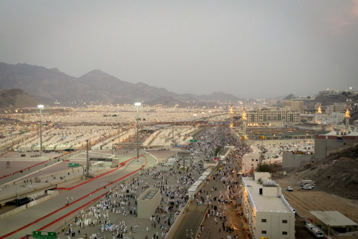 The massive tent city at Mina, where thousands of Muslim pilgrims are housed during visits to holy sites around Mecca. A Sept 24th stampede on one of the main roads nearby killed over 700 pilgrims. (Photo by Tariq Yusuf)