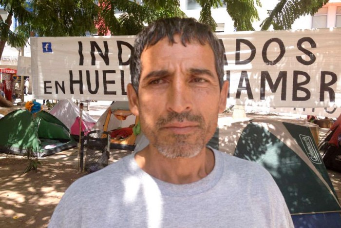 Oscar Maldonado, one of three men on the 14th day of a hunger strike, protesting corruption in Honduras' government. (Photo by Reagan Jackson)