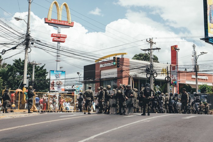 Local police respond to a street protest in Tegucigalpa, Honduras. (Photo by Dan Poss.)