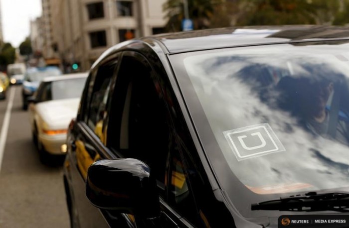 The Uber logo on a vehicle in San Francisco. (Photo by   REUTERS / Robert Galbraith)