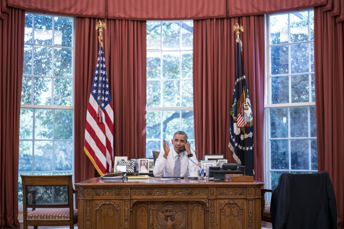 President Barack Obama talks on the phone with Cuba President Raúl Castro in the Oval Office, Sept. 18, 2015. (Official White House Photo by Pete Souza)