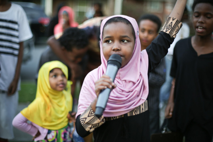 A member of the G.O.O.D. Girls addresses the crowd at Beautify the Block. (Photo by Jama Abdirahman)