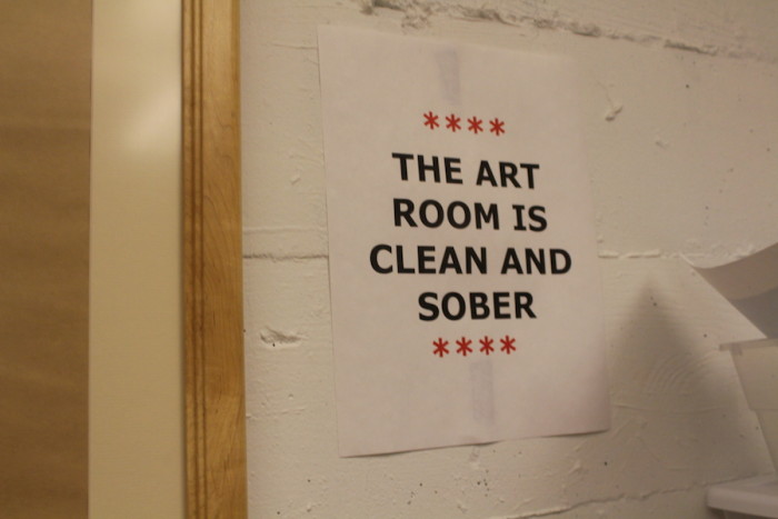 The Chief Seattle Club’s art room displays a sign that states, “The art room is clean and sober.” The CSC offers art activities as support programs for its members. (Photo by Starla Sampaco)