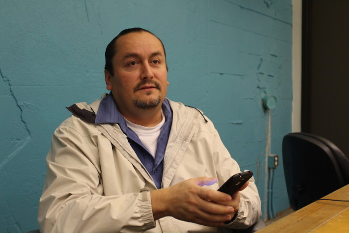 Derrick Belgarde reflects on his experience with homelessness. He is now the program manager of the Chief Seattle Club, which he says played a crucial role in his recovery. (Photo by Starla Sampaco)