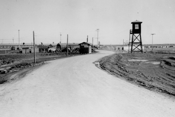 Camp road at Minidoka Relocation Center in Idaho during World War II. (Archive photo courtesy Densho.)