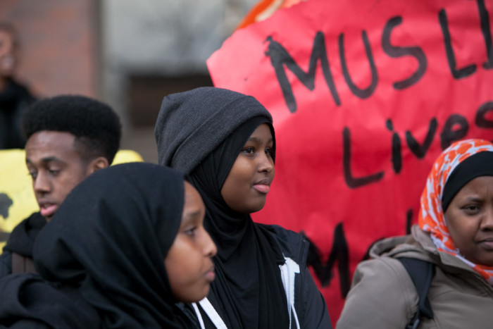 One of Hamza Warsame's older sisters, Ikram Warsame, at a Dec. 10 rally in front of Seattle Central College. (Photo by Jovelle Tamayo)