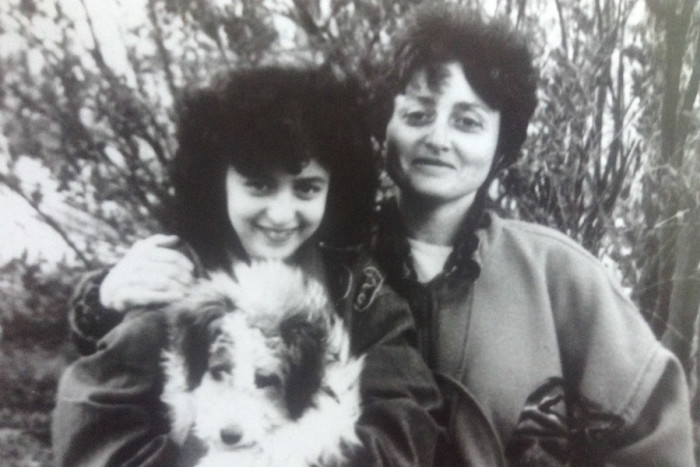 Irina Vodonos, her mother and their family dog in May 1994, several months before Vodonos and her father became the first in their family to move to the U.S. The rest of the family followed two years later. (Photo courtesy Irina Vodonos.)