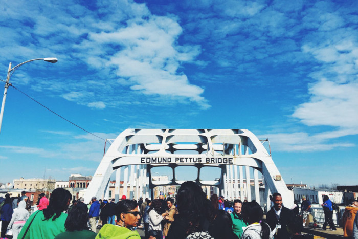 Marching across the historic Edmund Pettus Bridge in Selma, Alabama. (Photo by Aida Solomon)