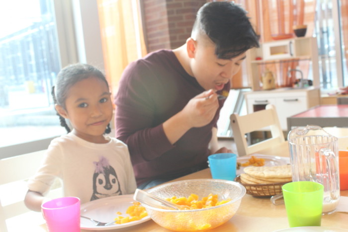 Pre-K teacher Johnson Nguyen (right) with one of his Vietnamese students at Hoa Mai. (Photo by Christina Twu)