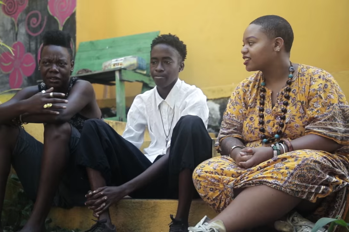 Moni Tep (right) interviews LGBTQ youth in Jamaica. (Screenshot of video by JetBlue Airways.)