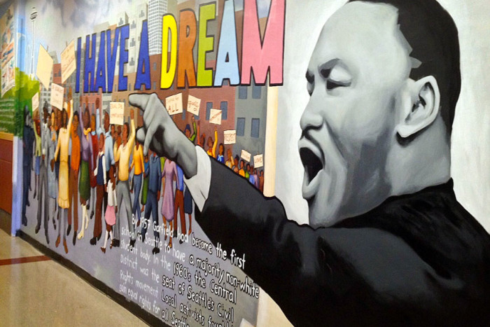 A mural celebrating Dr. Martin Luther King, Jr. adorns the halls of Garfield High School. (Photo from Flickr by Joe Wolf)
