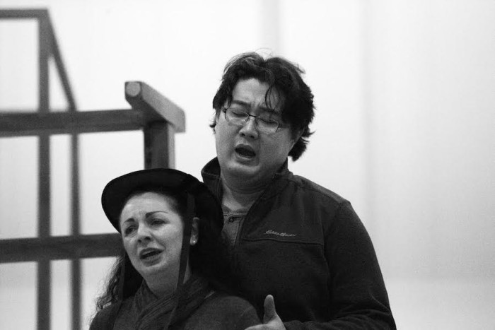 Nuccia Focile (Susanna) and Shenyang (Figaro) during a staging rehearsal for Seattle Opera’s upcoming production of "The Marriage of Figaro." (Photo by Philip Newton)
