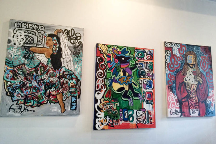 Ernesto Ybarra's art blends his upbringing in Minnesota with the traditional Mesoamerican influences of his heritage. From the left: “Seattle Seduction,” “Scribes” and Scribbles,” and “Blue Eyed Jesus.” (Photo by Cristy Acuna.)