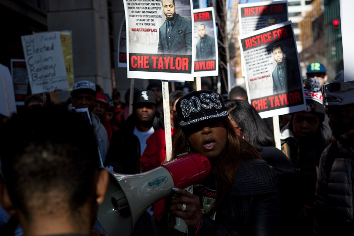 About 100 people attended a rally on Feb. 25, 2016 for Che Taylor, a black man who was shot and killed Sunday by Seattle Police. Demonstrators marched from SPD’s downtown headquarters to the Federal District Courthouse. (Photo by Jovelle Tamayo)