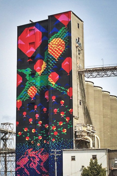 The “Bayview Rise” mural by Seattle artists Laura Haddad and Tom Drugan, on a decommissioned silo facility in San Francisco that's structurally similar to Pier 86. (Photo from Flickr by Aaron Muszalski)