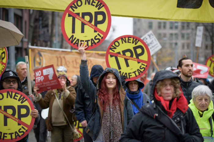 Seattleites gathered on Feb 3rd to protest the signing of the Trans-Pacific Partnership. The agreement still needs to be ratified by member countries. (Photo by Rick Barry)