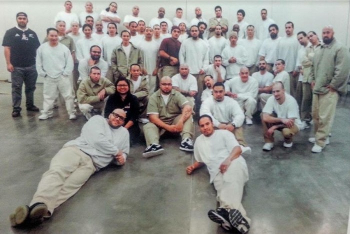 The organization Formerly Incarcerated Group Healing Together, or F.I.G.H.T., offer mentoring, support and political education to incarcerated men of Asian or Pacific Islander descent. The photo shows leaders and participants at Coyote Ridge Correctional Center in Eastern Washington. (Courtesy photo.)