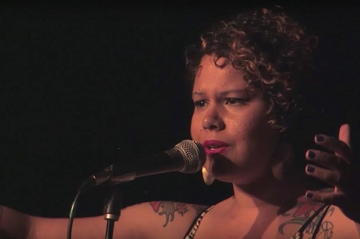 Screenshot of Nikkita Oliver performing her poem, "For Brown Girls" at the 2014 Poetry Slam in Oakland, Calif., which she won.