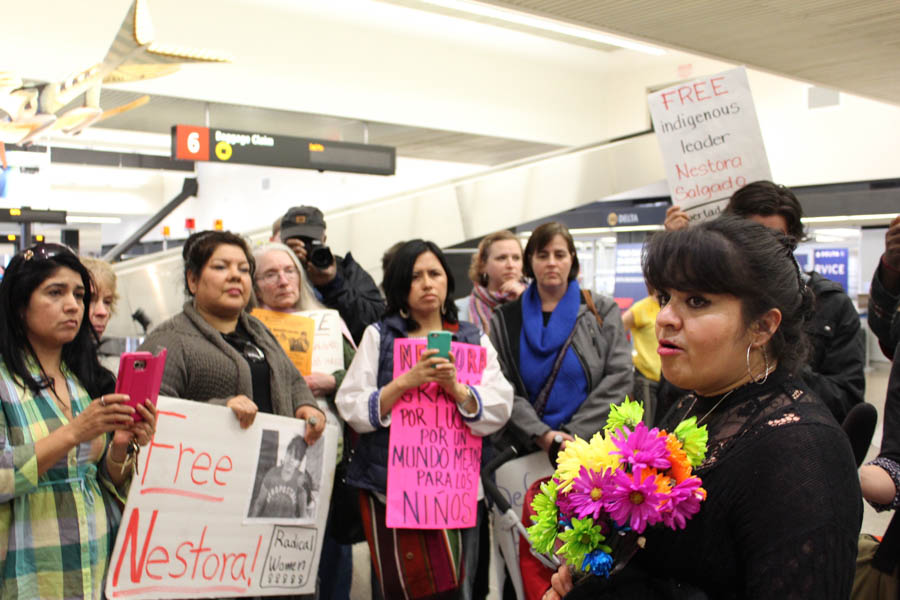Nestora Salgado (right) addresses her supporters at Seattle-Tacoma International Airport, as she returned to her Renton home after 31 months in jail in Mexico on charges that were dropped this month. (Photo by Venice Buhain.)