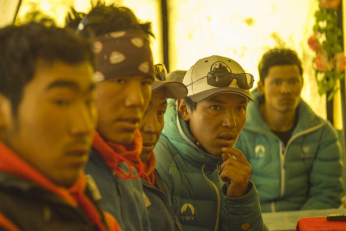 A still from the movie "Sherpa" shows a group of Sherpa attending meeting after the avalanche. Photo courtesy the Discovery Channel.)