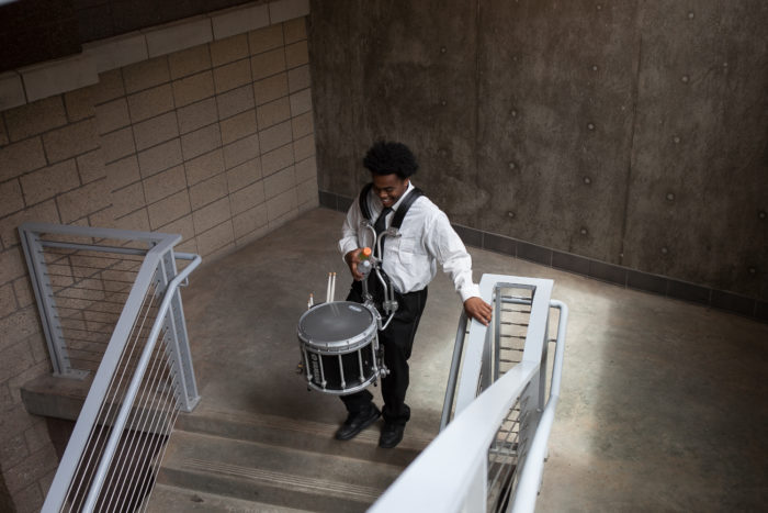 Senior Upendo Moore makes his way to practice before performing at the 8th Annual Bulldog Drumline Expo (BDX) on Saturday, May 28, 2016 with the Garfield High School drumline. The Garfield High School BDX is the largest drumline competition in Washington State. (Photo by Jovelle Tamayo)