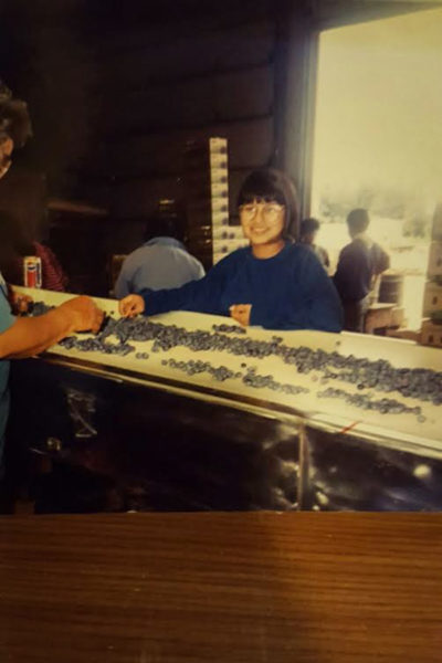 My mother working on the blueberry line at Sakuma Brothers in the 1990's. (Courtesy photo)