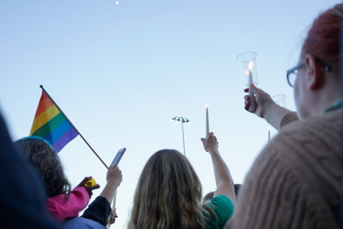 About 1,000 people gathered at Cal Anderson Park in Seattle Sunday night to honor the 49 victims of a mass shooting at a nightclub in Orlando. (Photo by Chloe Collyer.)