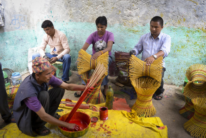Prisoners make stools at Kavre District Prison. The craft is one of three income-generating activities at the prison. The others are making quilts and making small temples used as shrines in homes. (Photo by Kalpana Khanal for GPJ Nepal)