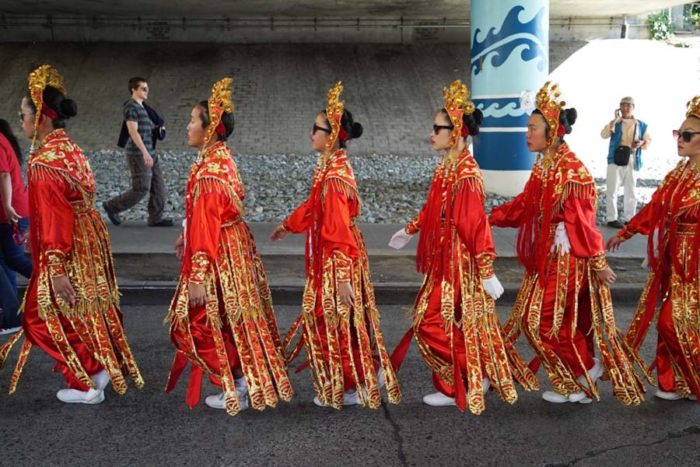 Seattle Chinese Community Girls Drill Team prepare for the Chinatown Parade.